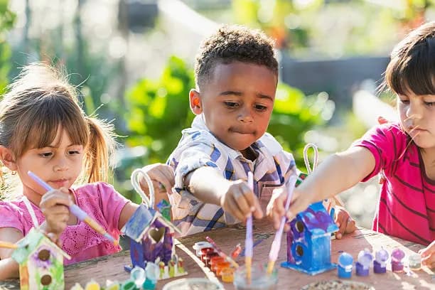 Children painting and crafting